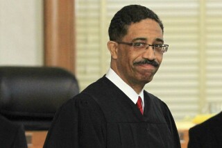 FILE - Associate Justice Michael Morgan attends a special session of the Supreme Court of North Carolina at New Bern City Hall, May 15, 2019, in New Bern, N.C. Morgan, a former state Supreme Court justice who stepped down early from the high court on Monday, Sept. 4, 2023, is challenging state Attorney General Josh Stein to become Gov. Roy Cooper's successor after the Democratic governor reaches the end of his term limit next year. (Gray Whitley/Sun Journal via AP, File)