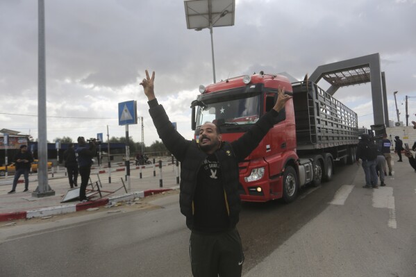 A Jordanian humanitarian aid convoy enters the Gaza Strip from Egypt in Rafah on Monday, Nov. 20, 2023. (AP Photo/Hatem Ali)