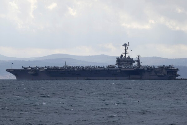 Aircraft carrier USS Harry S. Truman is moored near Split, Croatia, Feb. 14, 2022. (AP Photo/Darko Bandic, File)