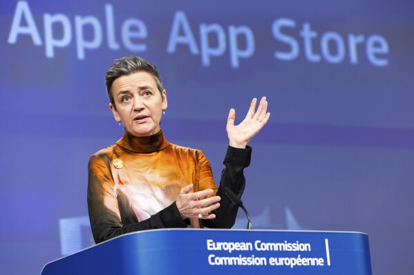 EU Commission vice president Margrethe Vestager addresses the media on Apple Music streaming services at EU headquarters in Brussels, Monday, March 4, 2024. Vestager addressed the media after the 27-nation bloc slapped a massive 1.8 billion fine on Apple for allegedly abusing its dominant position when it comes to music streaming services. (AP Photo/Geert Vanden Wijngaert)