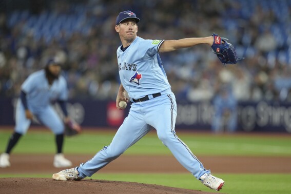 Toronto Blue Jays starting pitcher Chris Bassitt works against the New York Yankees during the first inning of a baseball game Thursday, Sept. 28, 2023, in Toronto. (Chris Young/The Canadian Press via AP)