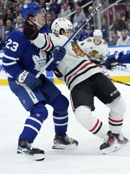Corey Perry scores as Chicago Blackhawks top Toronto Maple Leafs 4-1 - The  San Diego Union-Tribune