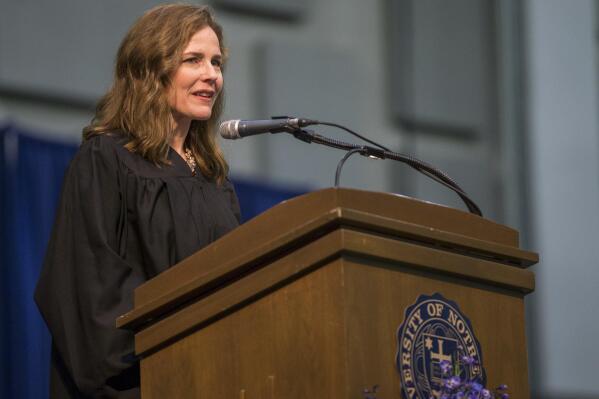FILE - In this May 19, 2018, file photo, Amy Coney Barrett, United States Court of Appeals for the Seventh Circuit judge, speaks during the University of Notre Dame's Law School commencement ceremony at the university, in South Bend, Ind. Barrett, a front-runner to fill the Supreme Court seat vacated by the death of Justice Ruth Bader Ginsburg, has established herself as a reliable conservative on hot-button legal issues from abortion to gun control. (Robert Franklin/South Bend Tribune via AP, File)