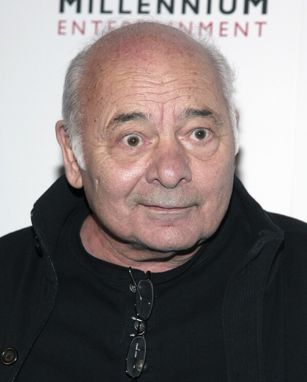 FILE - Burt Young attends a screening of "Rob The Mob" on March 9, 2014, in New York. Burt Young, the Oscar-nominated actor who played Paulie, the rough-hewn, mumbling-and-grumbling best friend, corner-man and brother-in-law to Sylvester Stallone in the “Rocky” franchise, has died. Young died Oct. 8, 2023 in Los Angeles. (Photo by Andy Kropa/Invision/AP, File)