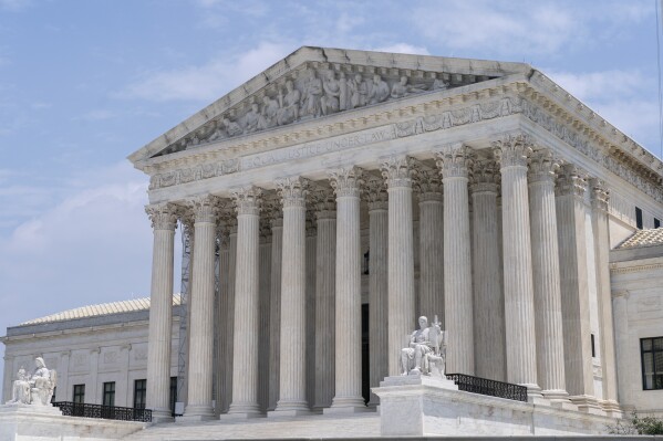 The Supreme Court is seen under a clearing sky, Friday, June 30, 2023, after case decisions were announced in Washington. (AP Photo/Jacquelyn Martin)