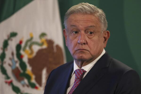 FILE - In this Feb. 8, 2021 file photo, Mexican President Andres Manuel Lopez Obrador gives his daily morning press conference following a two-week absence after he tested positive for the new coronavirus, at the National Palace in Mexico City. The Mexican leader has refused to mandate mask wearing or a declare any lockdown. And his obsessive drive to slash government spending may have contributed to the safety downgrade, which apparently involved insufficient staffing and oversight at airports. Lopez Obrador lashed out on both fronts Thursday, May 27, 2021, criticizing other governments rather than recognize any Mexican shortcomings. (AP Photo/Marco Ugarte, File)