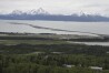 Homer, Alaska, and the Homer Spit, jutting out into Kachemak Bay, is seen on June 9, 2021. Alaska State Troopers say a 70-year-old Homer man attempting to take photos of newborn moose calves was attacked and killed by the calves' mother in Homer on Sunday, May 19, 2024. (AP Photo/Mark Thiessen)