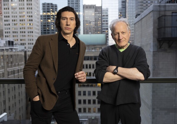 FILE - Adam Driver, left, and director Michael Mann pose for a portrait to promote 