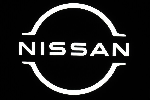 FILE - Logo of Nissan is seen at the Japan Mobility Show in Tokyo on Oct. 26, 2023. Nissan’s profit for the fiscal year through March jumped 92% to 426.6 billion yen ($2.7 billion) as sales grew in all major global markets except China, the Japanese automaker said Thursday, May 9, 2024. (AP Photo/Eugene Hoshiko, File)