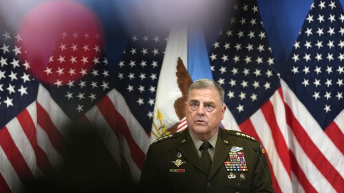 FILE - Chairman of the Joint Chiefs of Staff U.S. General Mark Milley addresses the media during a meeting of NATO defense ministers at NATO headquarters in Brussels, on June 15, 2023. The top U.S. military official on Friday, July 14, encouraged Japan's recent commitment to doubling its defense spending over the next five years, calling Tokyo's new, controversial push for a stronger military a crucial part of efforts to confront rising threats from North Korea and China. (AP Photo/Virginia Mayo, File)