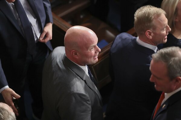 
              In this Feb. 5, 2019, photo, acting Attorney General Matthew Whitaker, center,  and acting Secretary of Defense Patrick Shanahan, right, and members of President Donald Trump's cabinet arrive to attend the State of the Union address to a joint session of Congress on Capitol Hill in Washington. (AP Photo/Andrew Harnik)
            