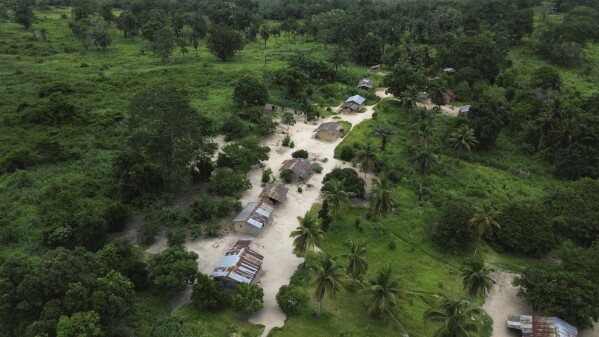 A view of Kimpozia village, one of the areas auctioned for oil drilling, in Moanda, Democratic Republic of the Congo, Monday, Dec. 25, 2023. Its government is auctioning off 30 oil and gas blocks around the country.(AP Photo/Mosa'ab Elshamy)