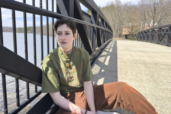 Julia Dupuis, one of 61 activists indicted on racketeering charges in connection with Atlanta's "Stop Cop City" movement, poses for a portrait in Worcester, Mass., on April 14, 2025. (AP Photo/Rodrique Ngowi)