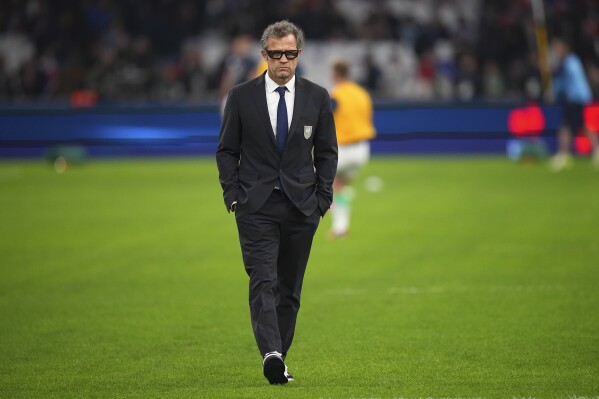 France's head coach Fabien Galthie walks on the pitch before the Six Nations rugby union match between France and Ireland in Marseille, Friday, Feb. 2, 2024. (AP Photo/Daniel Cole)