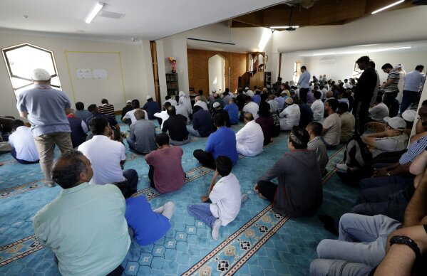 In this Friday, Feb. 28, 2020, photo, Muslims pray during Friday Prayers at the Al Noor mosque in Christchurch, New Zealand. New Zealanders on Sunday, March 15, 2020, will commemorate those who died on the first anniversary of the mass killing, as the tragedy continues to ripple through the community. Three people whose lives were forever altered that day say it has prompted changes in their career aspirations, living situations and in the way that others perceive them. (AP Photo/Mark Baker)