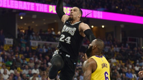 FILE - Memphis Grizzlies forward Dillon Brooks (24) goes up to dunk against Los Angeles Lakers forward LeBron James (6) during the first half of Game 2 of a first-round NBA basketball playoff series April 19, 2023, in Memphis, Tenn. Brooks is getting a new home with the Houston Rockets after agreeing to a four-year deal worth nearly $80 million, a source told AP. (AP Photo/Brandon Dill, File)