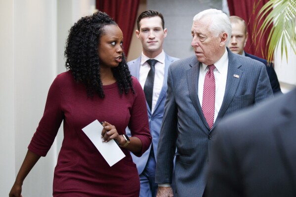 FILE - Shuwanza Goff, left, speaks with House Majority Leader Steny Hoyer of Md., as they walk on Capitol Hill in Washington, Jan. 4, 2019. President Biden announced that Goff will serve as Assistant to the President and Director of the Office of Legislative Affairs. (AP Photo/Carolyn Kaster, File)