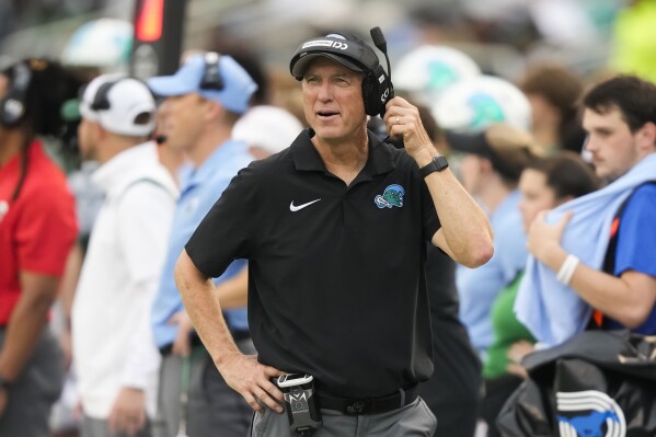 Tulane head coach Willie Fritz watches from the sideline during the first half of the American Athletic Conference Championship NCAA college football game against SMU, Saturday, Dec. 2, 2023 in New Orleans. (AP Photo/Gerald Herbert)