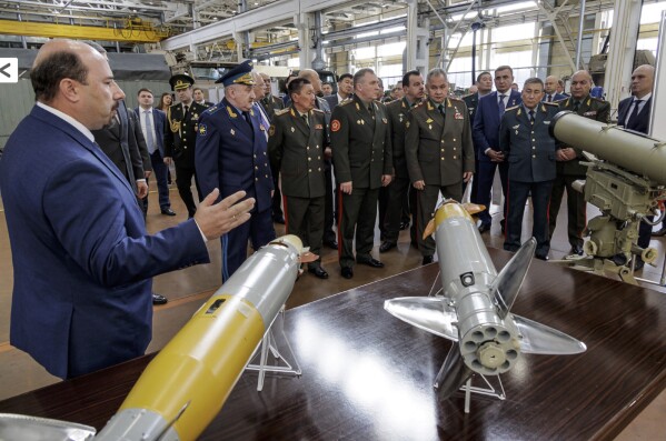 FILE - In this photo released by Russian Defense Ministry Press Service on Saturday, Sept. 30, 2023, Defense Minister Sergei Shoigu, center right, and Defense Ministers of the Council of Commonwealth of Independent States (CIS) visit a military plant in Tula, Russia. Russia has managed to significantly increase the output of its defense industries amid the fighting in Ukraine. (Russian Defense Ministry Press Service via AP, File)