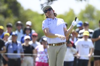 Cameron Smith reacts after a shot during round 2 of the 2023 Australian PGA Championship in Brisbane, Friday, Nov. 24, 2023. (Jono Searle/AAP Image via AP)