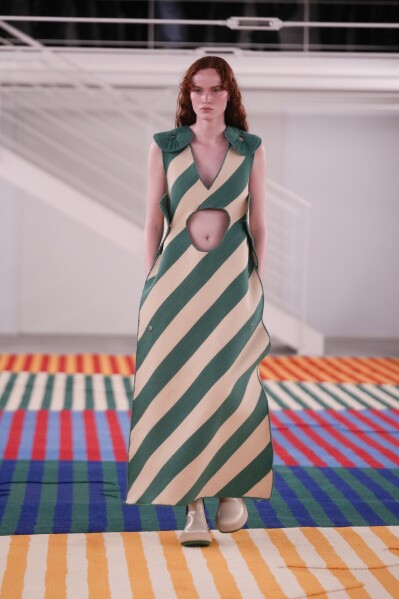A model wears a creation as part of the Sunnei women's Fall-Winter 2024-25 collection presented in Milan, northern Italy, Friday, Feb. 23, 2024. (AP Photo/Luca Bruno)