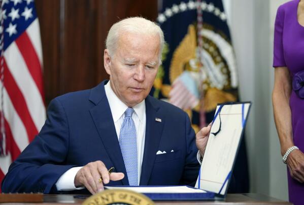 Biden signs landmark gun measure, says 'lives will be saved