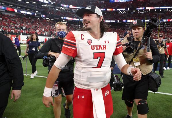 Utah quarterback Cameron Rising (7) walks across the field after Utah's 47-24 victory over Southern California in the Pac-12 Conference championship NCAA college football game Friday, Dec. 2, 2022, in Las Vegas. (AP Photo/Steve Marcus)