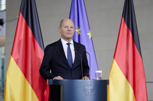 German Chancellor Olaf Scholz gives a statement at the chancellery in Berlin, Germany, Wednesday, Jan. 8, 2025. (AP Photo/Markus Schreiber)