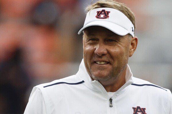 FILE - Auburn head coach Hugh Freeze is seen before an NCAA college football game Sept. 16, 2023, in Auburn, Ala. The Auburn Tigers have a new offensive coordinator, new wide receivers and renewed competition at quarterback. (AP Photo/Butch Dill, File)
