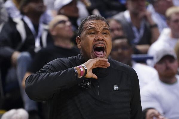 FILE - Providence head coach Ed Cooley shouts to his players on the court during the second half of a first-round college basketball game against the Kentucky in the NCAA Tournament on Friday, March 17, 2023, in Greensboro, N.C. Ed Cooley is the new men’s basketball coach at Georgetown, hired away from Big East rival Providence in the hopes of rebuilding a once-proud program that dropped to new lows under former star player Patrick Ewing.Georgetown announced the move on Monday, March 20, 2023, after Providence issued a news release saying that Cooley had resigned.(AP Photo/John Bazemore, File)