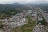 In this photo provided by China's Xinhua News Agency, an aerial view shows damaged buildings in the aftermath of a tornado in Guangming Village of Zhongluotan Town, Baiyun District, Guangzhou, south China's Guangdong Province, Sunday, April 28, 2024. Aerial photos posted by Chinese state media on Sunday showed the wide devastation of a part of the southern city of Guangzhou after a tornado swept through the day before, killing and injuring dozens of people and damaging over a hundred buildings. (Deng Hua/Xinhua via AP)