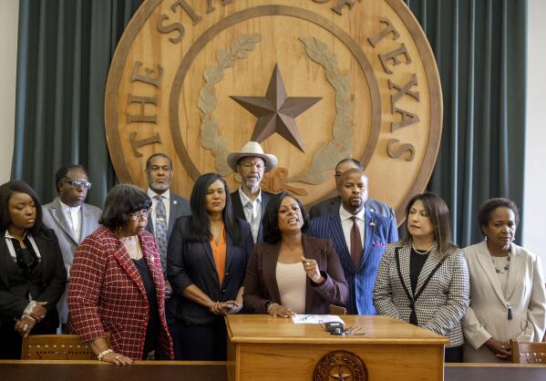 State Rep. Nicole Collier, D- Fort Worth, the chair of the Legislative Black Caucus, speaks at a news conference at the Capitol on Sunday May 30, 2021, against Senate Bill 7, known as the Election Integrity Protection Act. New restrictions on voting in Texas are one step away from the governor's desk. Republicans in the Texas Senate early Sunday muscled through a sweeping measure that would eliminate drive-thru voting and empower partisan poll watchers. It would also impose new limits on Sunday voting, when many Black churchgoers head to the polls. (Jay Janner/Austin American-Statesman via AP)