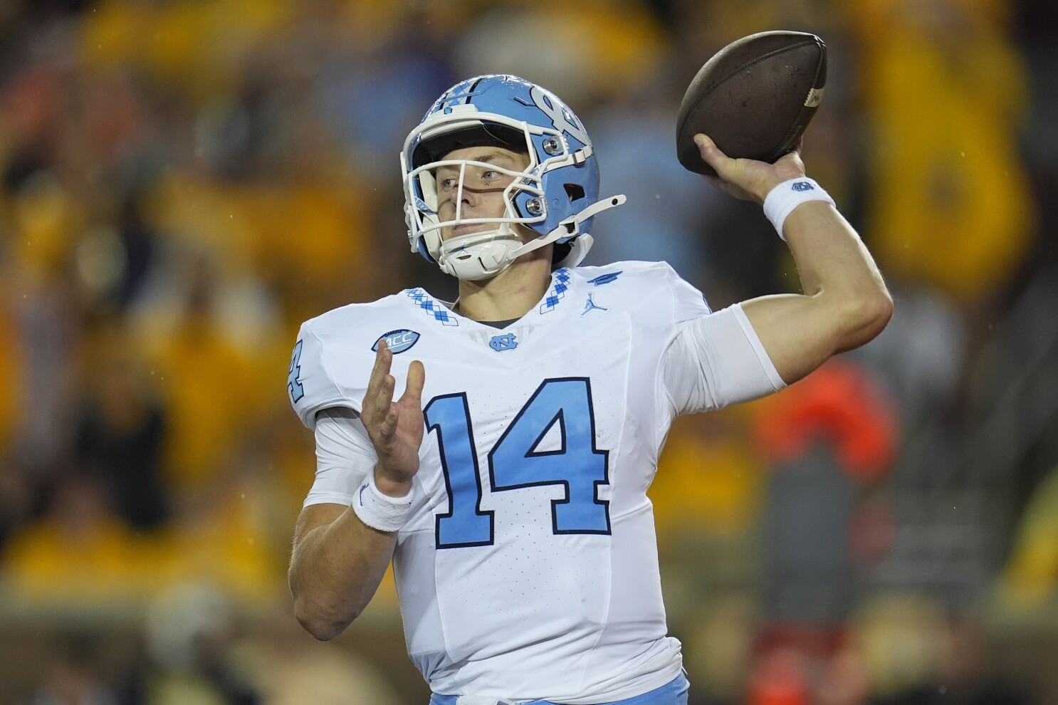 North Carolina QB Max Johnson taken to hospital, after 3rd quarter leg injury at Minnesota | AP News