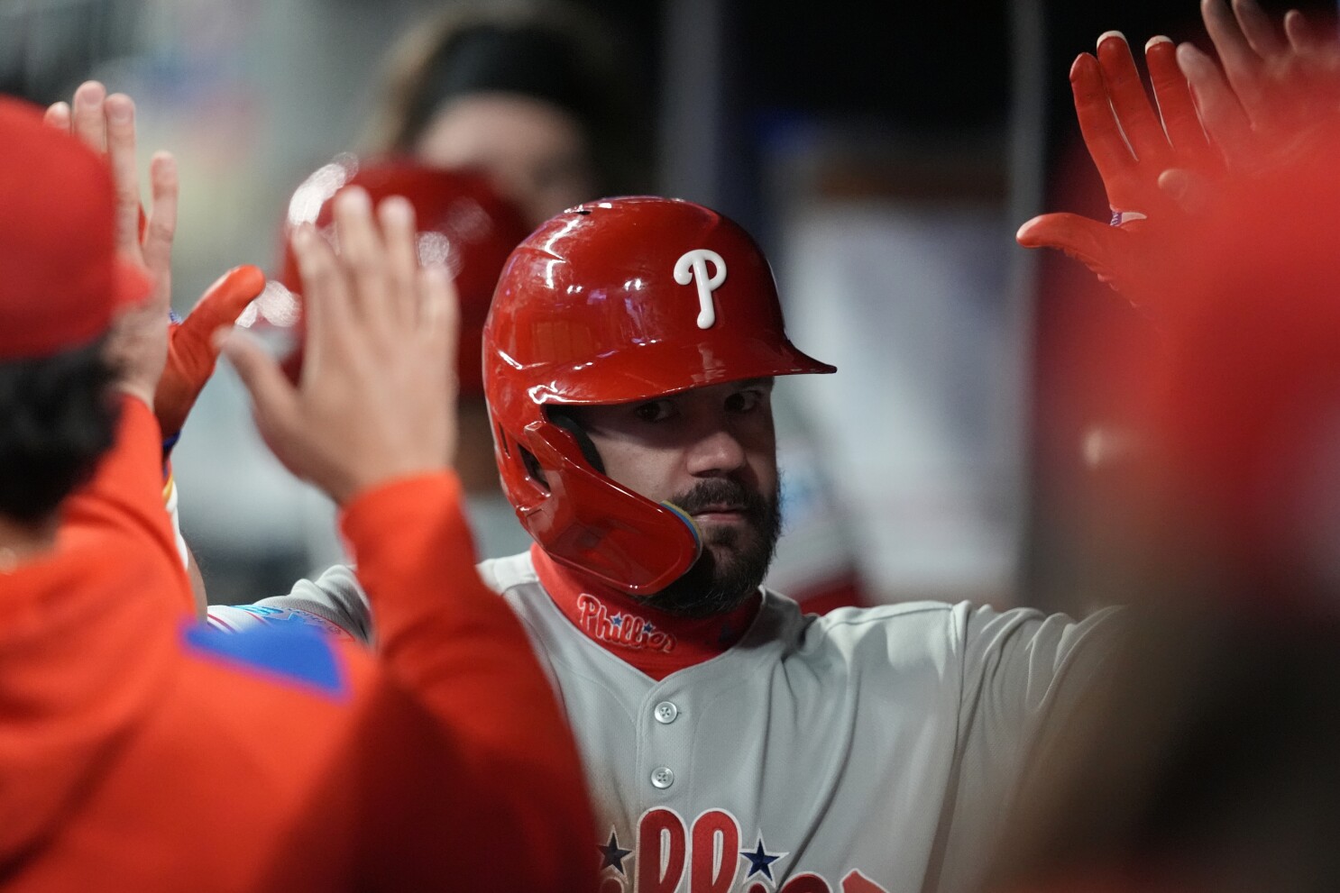 Murphy homers in his return from a rib injury as the Braves beat the Phillies 7-5