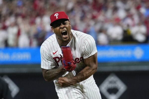 Philadelphia Phillies pitcher Gregory Soto celebrates the team's win over the Miami Marlins in Game 2 of an NL wild-card baseball playoff series Wednesday, Oct. 4, 2023, in Philadelphia. The Phillies swept the series, and move on to face the Atlanta Braves. (AP Photo/Matt Rourke)