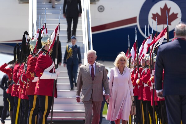 King Charles and Queen Camilla arrive at the Ottawa International Airport. (Justin Tang/The Canadian Press via AP)