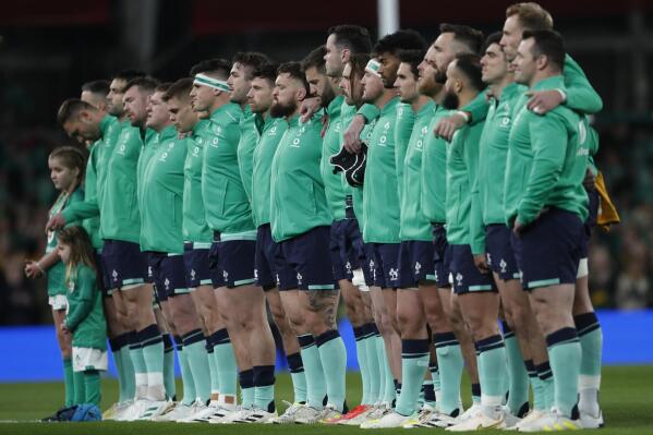 Ireland's players line up for the singing of the national anthems at the start of the rugby union international match between Ireland and South Africa at the Aviva Stadium in Dublin, Ireland, Saturday, Nov. 5, 2022. (AP Photo/Peter Morrison)