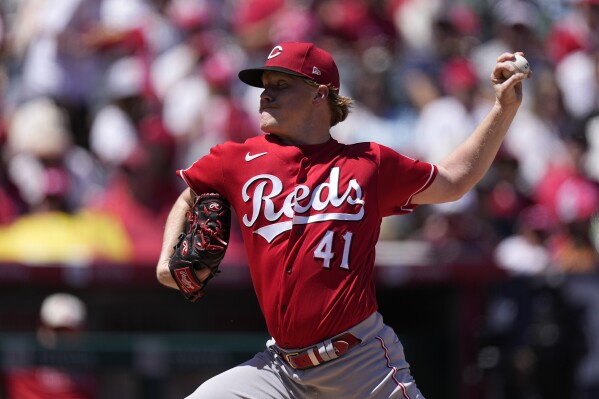 Cincinnati Reds starting pitcher Andrew Abbott throws to the plate during the second inning of a baseball game against the Los Angeles Angels Wednesday, Aug. 23, 2023, in Anaheim, Calif. (AP Photo/Mark J. Terrill)