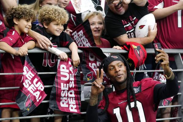 Kyler Murray gives young fan signed jersey after boy had one stolen
