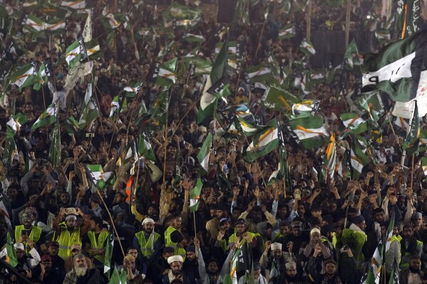 Supporters of the Pakistani religious group Tehreek-e-Labbaik Pakistan (TLP) attend an election campaign rally in Karachi, Pakistan, Sunday, Feb. 4, 2024. (AP Photo/Fareed Khan)