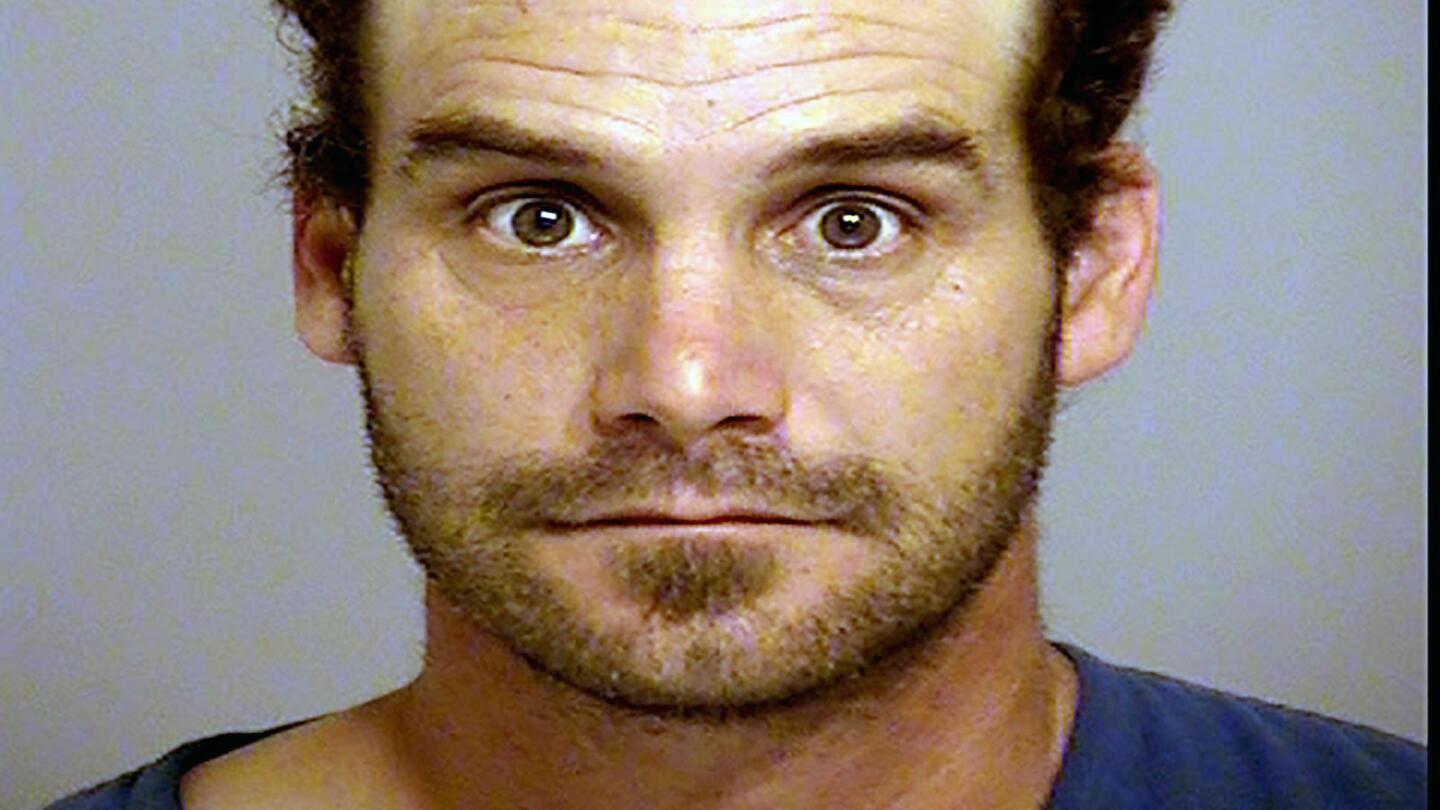 California man arrested after firing gun at helicopter AP News