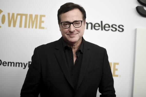 FILE - Bob Saget attends the "Shameless" FYC event at Linwood Dunn Theater on Wednesday, March 6, 2019, in Los Angeles. Saget, a comedian and actor known for his role as a widower raising a trio of daughters in the sitcom “Full House,” has died, according to authorities in Florida, Sunday, Jan. 9, 2022. He was 65. (Photo by Richard Shotwell/Invision/AP, File)