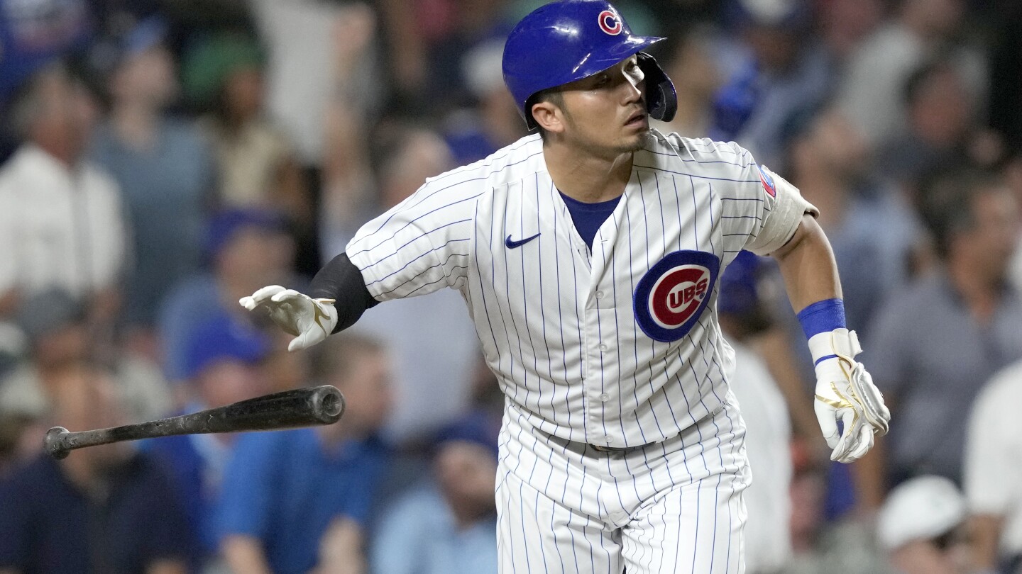 July 5, 2022: Chicago Cubs right fielder Seiya Suzuki #27 hugs Chicago Cubs  center fielder Christopher Morel #5 after hitting a two-run home run in the  fifth inning during MLB game between