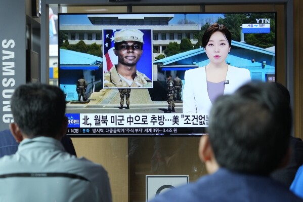 A TV screen shows a file image of American soldier Travis King during a news program at the Seoul Railway Station in Seoul, South Korea, Thursday, Sept. 28, 2023. The U.S. has secured the release of King who sprinted across a heavily fortified border into North Korea more than two months ago, and he is on his way back to America, officials announced Wednesday. U.S. ally Sweden and rival China helped with the transfer. (AP Photo/Ahn Young-joon)