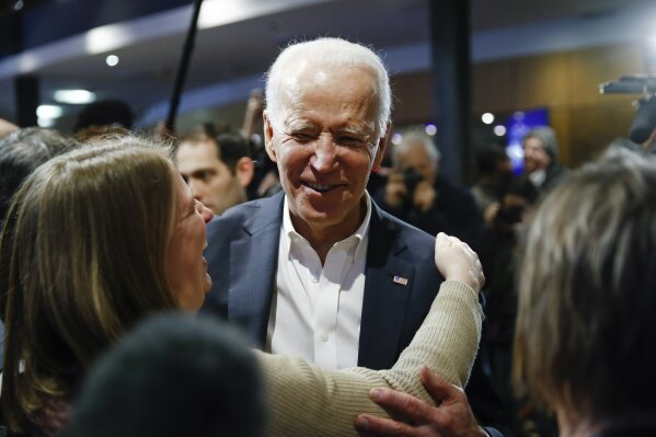 Democratic presidential candidate former Vice President Joe Biden meets with attendees during a campaign event, Thursday, Jan. 30, 2020, in Newton, Iowa. (AP Photo/Matt Rourke)