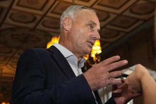 Major League Baseball Commissioner Rob Manfred speaks with the news media after a meeting of MLB owners, Thursday, Feb. 9, 2023, in Palm Beach, Fla. (AP Photo/Lynne Sladky)