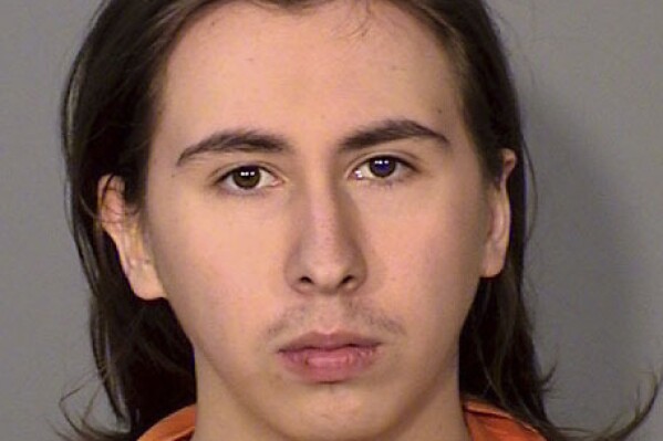 This booking photo provided by the Ramsey County, Minn., Sheriff's Office shows Keanu Labatte, 19, accused of holding his girlfriend captive in her dorm room at a university in Minnesota while he raped, beat and waterboarded her for days until she escaped. Labatte was arrested Sunday, Sept. 10, 2023, at St. Catherine University, an all-female school in St. Paul, Minn. (Ramsey County Sheriff's Office via AP)