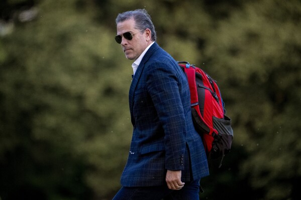FILE - Hunter Biden, the son of President Joe Biden, walks from Marine One upon arrival at Fort McNair, June 25, 2023, in Washington. The Republican chairmen of three key House committees are joining forces to probe the Justice Department's handling of charges against Hunter Biden after making sweeping claims about misconduct at the agency. (AP Photo/Andrew Harnik, File)