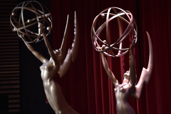 FILE - Emmy statues appear at the 70th Primetime Emmy Nominations Announcements at the Television Academy's Saban Media Center on July 12, 2018, in Los Angeles. HBO could dominate Wednesday morning's Emmy nominations, but the Hollywood writers' strike and the possibility that actors could join them have cast a cloud over the process. (Photo by Chris Pizzello/Invision/AP, File)