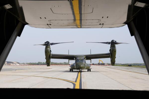 FILE - A U.S. Marine Corps Osprey aircraft taxies behind an Osprey carrying members of the White House press corps at Andrews Air Force Base, Md., on April 24, 2021. Norwegian authorities are searching for a U.S. Marine Corps aircraft that went missing during a training exercise. Norway's military says the Marine Osprey was reported missing Friday night. March 18, 2022, when it did not make a scheduled arrival at the Arctic Circle municipality Bodø. (AP Photo/Patrick Semansky)